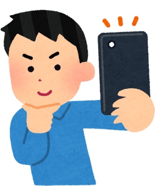自撮りする男性